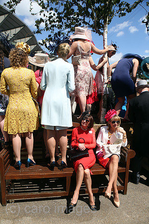 Royal Ascot, Fashion on Ladies Day, women with hats at the racecourse waiting for the Queen