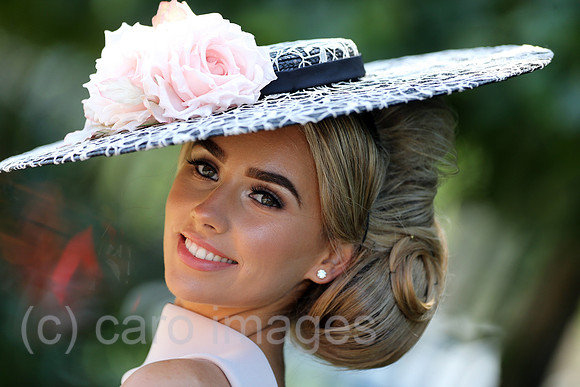 Royal Ascot, Fashion on Ladies Day, woman with hat at the racecourse