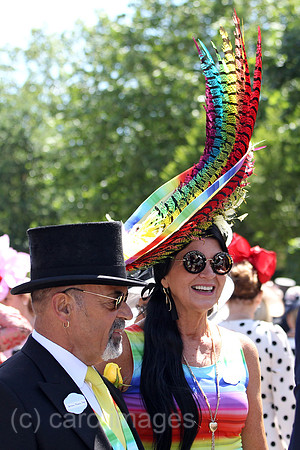 Royal Ascot, Fashion on Ladies Day, woman with hat and man with top hat at the racecourse
