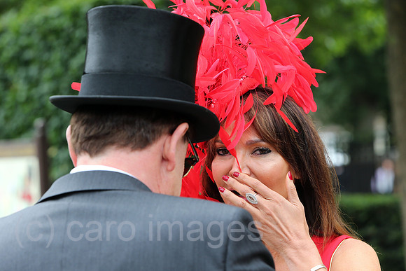Royal Ascot, Fashion, woman with hat and man with top hat at the racecourse