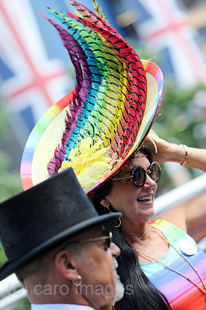 Royal Ascot, Fashion on Ladies Day, woman with hat and man with top hat at the racecourse