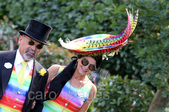 Royal Ascot, Fashion on Ladies Day, woman with hat and man with top hat at the racecourse