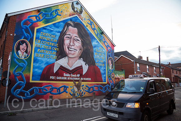 Grossbritannien, Nordirland, Belfast - Sinn-Fein-Gebauede mit Bobby-Sands-Portrait an der Falls Road, katholisches West Belfast