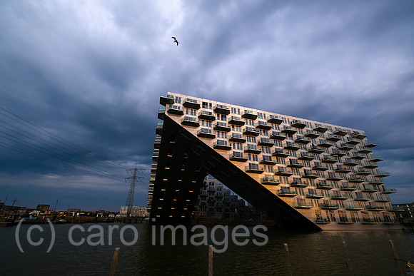 Netherlands, Amsterdam - residential project Sluishuis (lock house) on an artificial island affordable living space in IJburg, a new district in the east of the city created as part of the VINEX housi