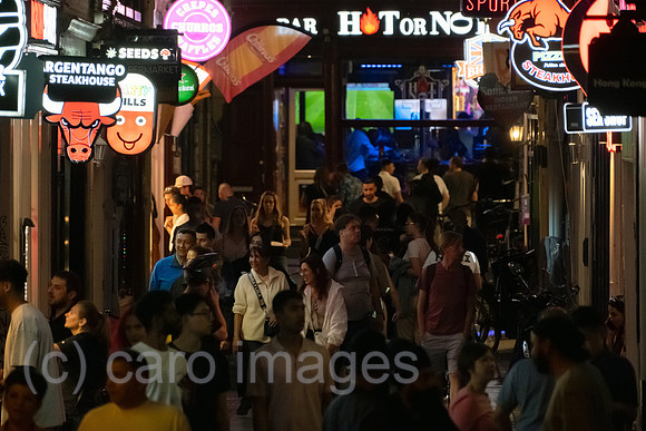 Netherlands, Amsterdam - overcrowded alley in the old town (red light district, city centre)