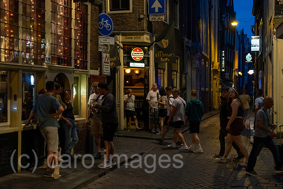 Netherlands, Amsterdam - old town (city centre) (city centre) with many tourists near the train station