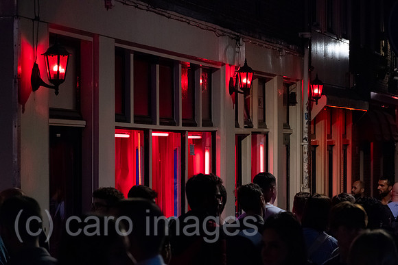 Netherlands, Amsterdam - Red light district in the canal belt (city centre), crowds in front of prostitutes' windows