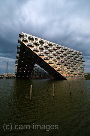 Netherlands, Amsterdam - residential project Sluishuis (lock house) on an artificial island affordable living space in IJburg, a new district in the east of the city created as part of the VINEX housi